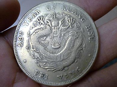 如何規(guī)范古玩真?zhèn)舞b定